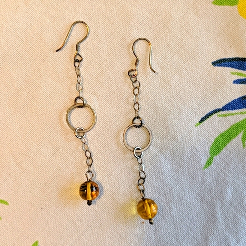 Silver earrings with amber bead